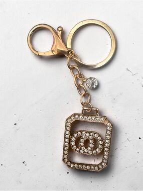 Gold Crystal Keychain Charm with Interlocking Rings Accent